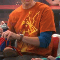 Sheldon wearing Flash Lightning shirt