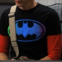 Sheldon's rainbow color Batman shirt