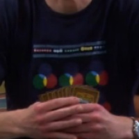 Sheldon wearing Thinker Clothing Screens & Lenses shirt
